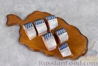 Скумбрия, запечённая с помидорами и луком