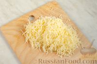 Слоёный рыбный салат с крекерами, морковью и сыром