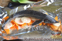 Осетр, запеченный в духовке, с овощами