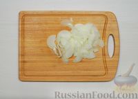 Рыба, тушенная в томатном соусе с овощами