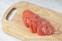 Минтай, запечённый с помидорами и сыром